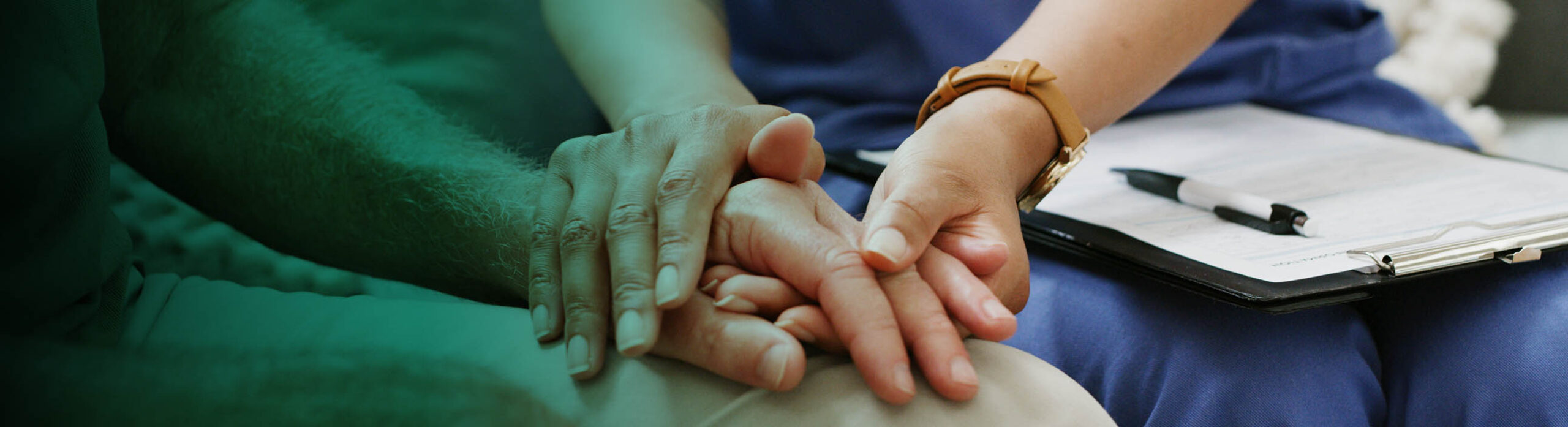 Therapist Holding Client's Hand